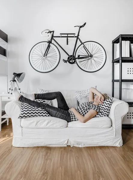 Woman resting on the sofa — Stock Photo, Image