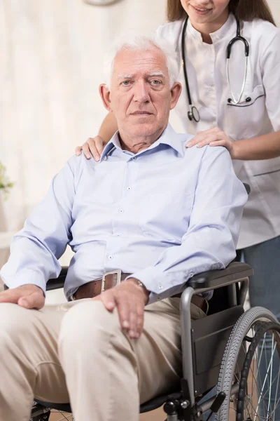 Man en rolstoel — Stockfoto