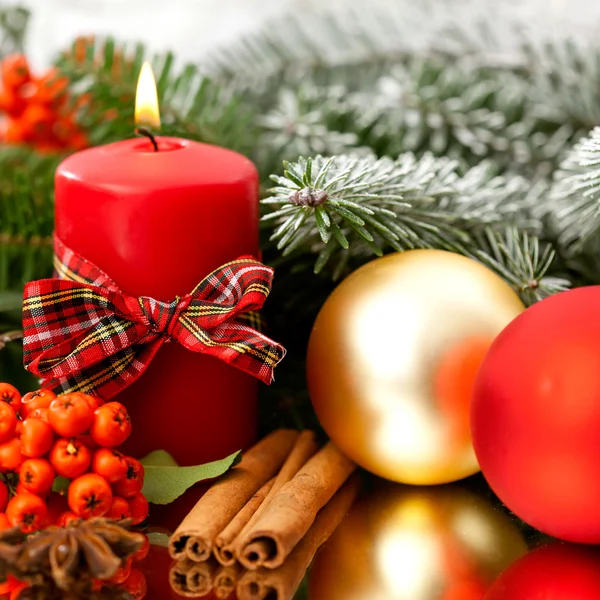 Candle, cinnamon and spruce — Stock Photo, Image