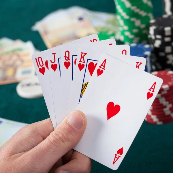 Hand holding royal flush — Stock Photo, Image