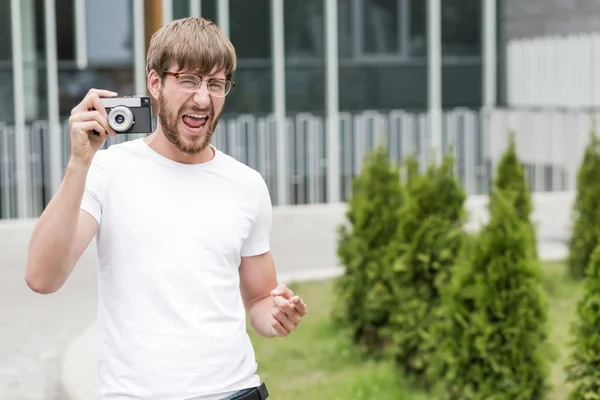 Man met camera — Stockfoto