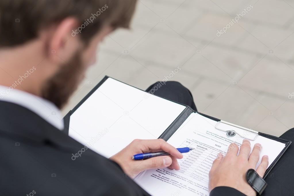 Man reading documents