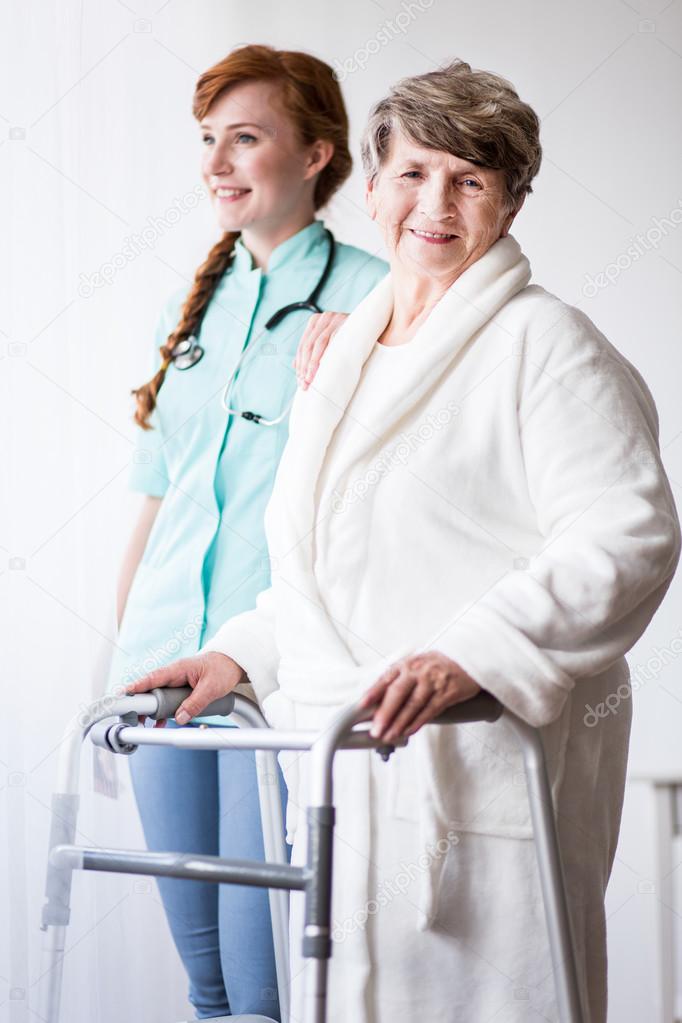 Woman with walking zimmer