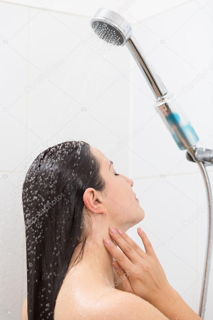 Woman refreshing with cold water