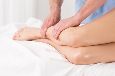 Physical therapist doing lymphatic drainage