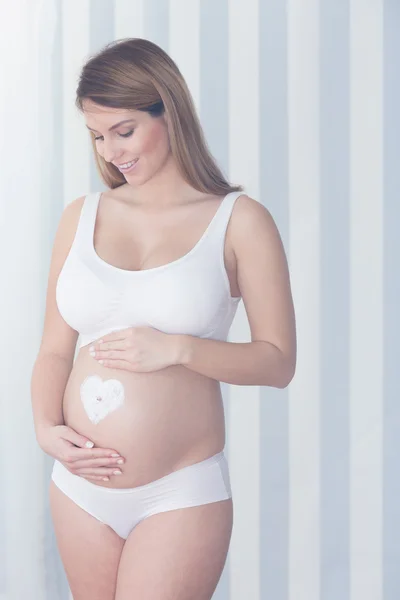 Female preparing for motherhood — Stock Photo, Image