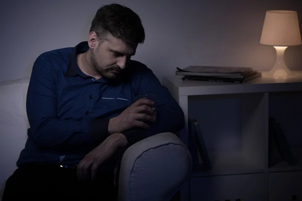 Heartbroken lonely man drinking vodka — Stock Photo, Image