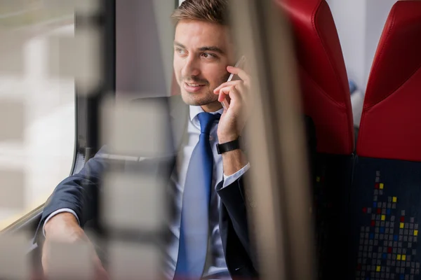 Passenger talking on the phone — Stock Photo, Image