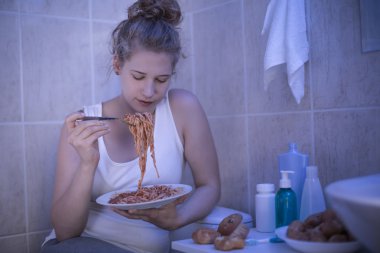 Girl eating spaghetti clipart