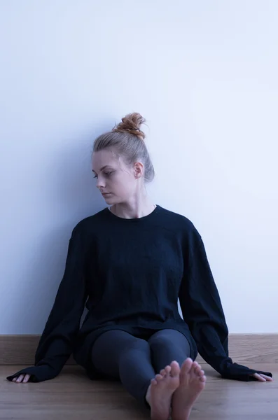 Despair girl in black clothes — Stock Photo, Image