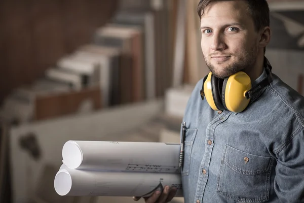 Joiner holding projects — Stock Photo, Image