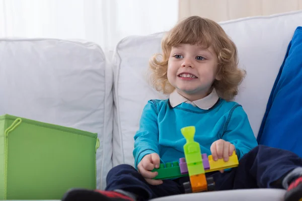 Little boy and toy — Stock Photo, Image