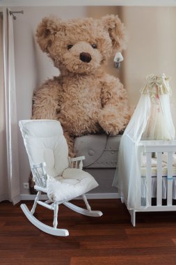 Rocking chair in nursery room