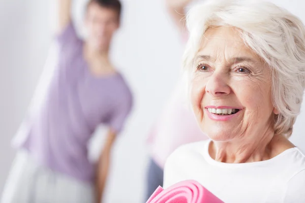 Mature sporty female at studio — Stock Photo, Image