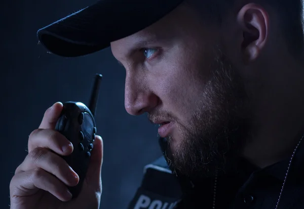 Policeman with radio — Stock Photo, Image