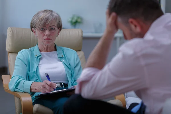 Personal counselor helping stressed man — Stock Photo, Image