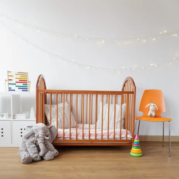 Child room with wooden crib