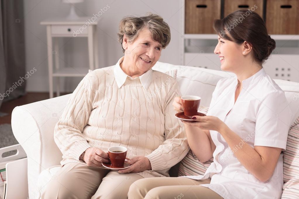 Nurse visiting patient at home