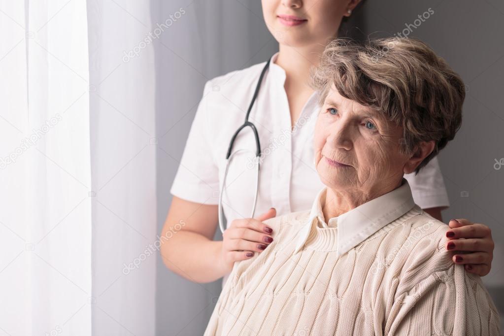 Ill senior and nurse