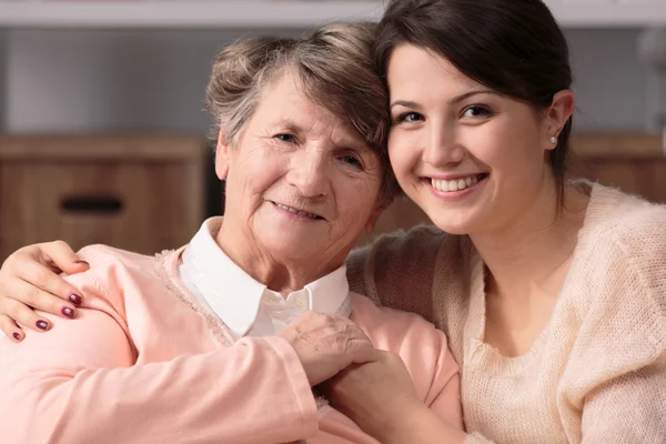 Friendship between carer and senior Stock Photo