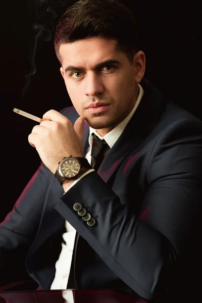 Boss smoking cigarette — Stock Photo, Image