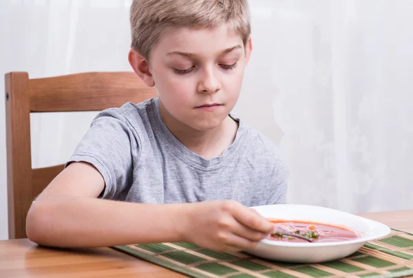 Schooljongen met geen eetlust — Stockfoto