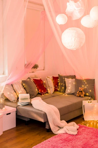 Fairy lights in bedroom — Stock Photo, Image