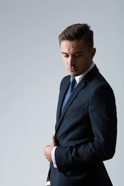 Man in navy suit — Stock Photo, Image