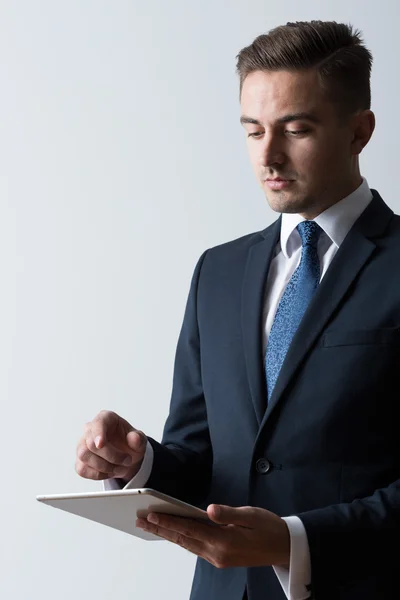 Stylish businessman with tablet — Stock Photo, Image