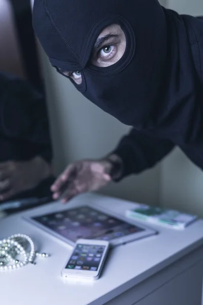 Thief in black mask — Stock Photo, Image
