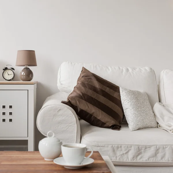 White couch and commode — Stock Photo, Image