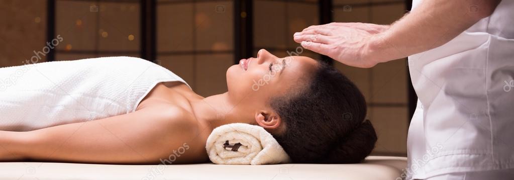 Afroamerican woman during massage
