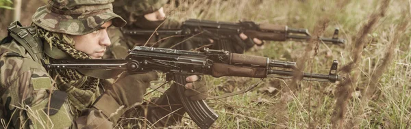 Soldiers and training ground — Stock Photo, Image