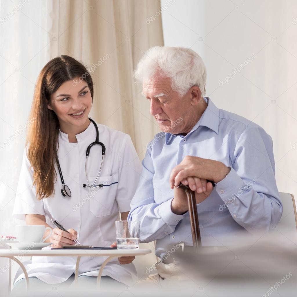 Patient talking to community nurse
