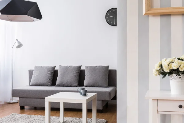 Three people can relax on this sofa — Stock Photo, Image