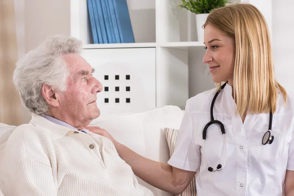 Doctor supporting her patient — Stock Photo, Image