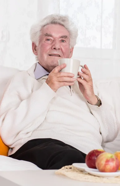 Senior man with coffee — Stock Photo, Image