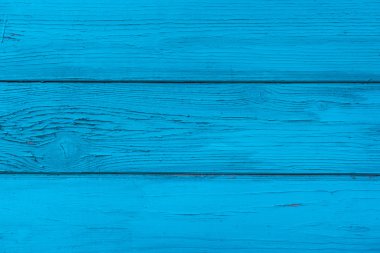 Doğal ahşap mavi tahtalar, duvar veya çit düğümleri ile. Boyalı ahşap yatay plakalar. Soyut dokulu arka plan, boş şablon