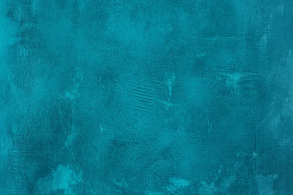 Velho arranhado e rachado pintado parede azul. Abstrato texturizado fundo turquesa, modelo vazio — Fotografia de Stock