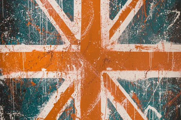 Painted concrete wall with faded graffiti of British flag. Grunge and vintage flag of United Kingdom. Union Jack — Stock Photo, Image
