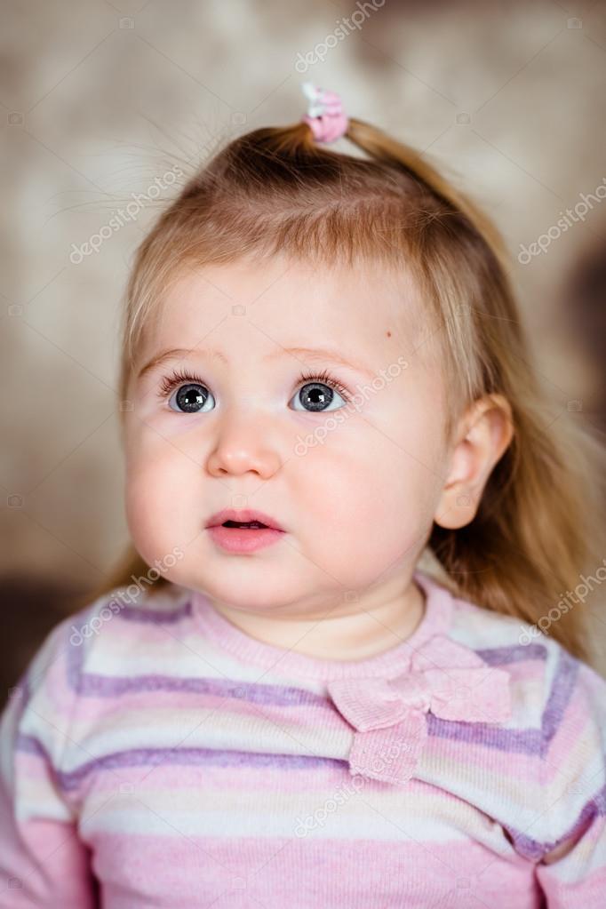 Cute Baby Girl With Grey Eyes