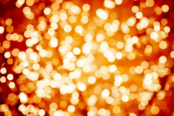 Flame-coloured background with natural bokeh defocused sparkling lights. Colorful fiery texture with twinkling lights. Bright and vivid colors — Stock Photo, Image