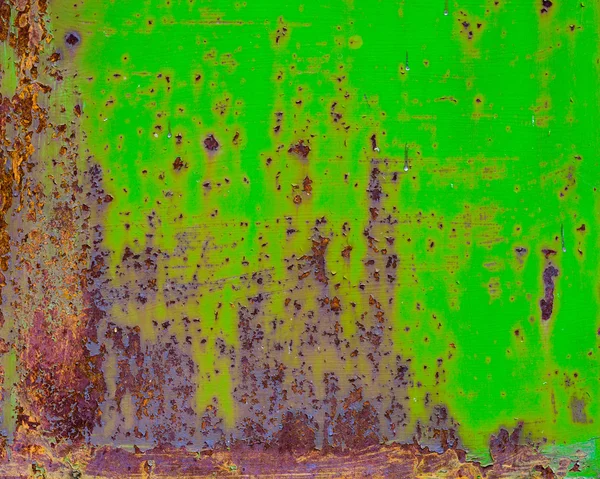 Rusty metallo verniciato con vernice incrinata. Colori arancio, marrone e verde. Texture colore grunge sfondo — Foto Stock