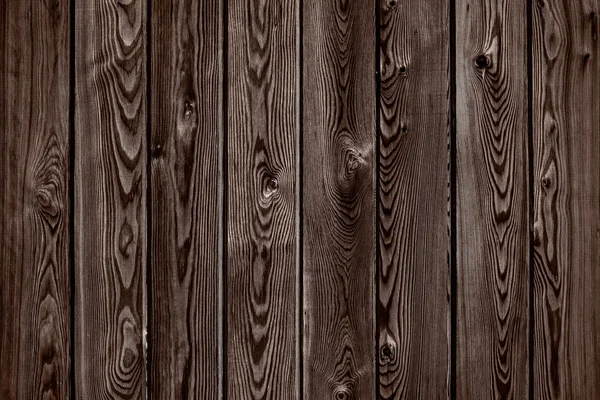 Natuurlijke houten bruin en chocolade planken, muur of hek met knopen. Abstracte textuur achtergrond, lege sjabloon Stockfoto