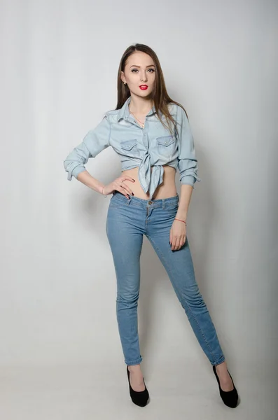 Girl in jeans clothes — Stock Photo, Image