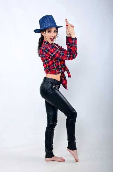 Menina em roupas de cowboy — Fotografia de Stock