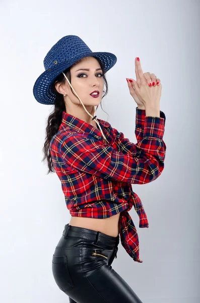 Meisje in cowboy kleding — Stockfoto