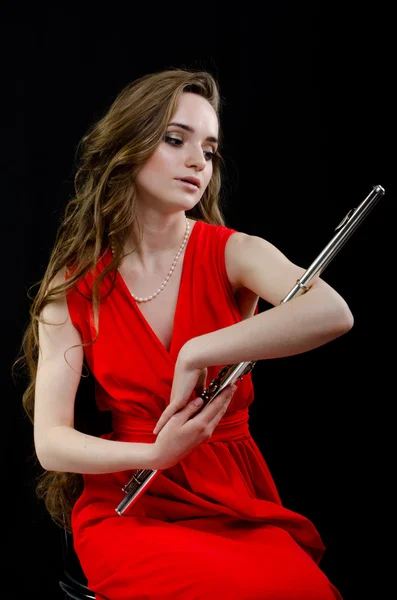 Menina com uma flauta — Fotografia de Stock