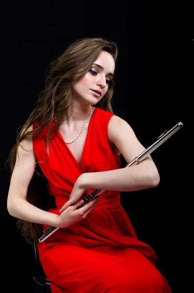 Girl with a flute — Stock Photo, Image