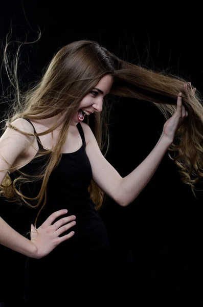 Girl playing with hair — Stock Photo, Image